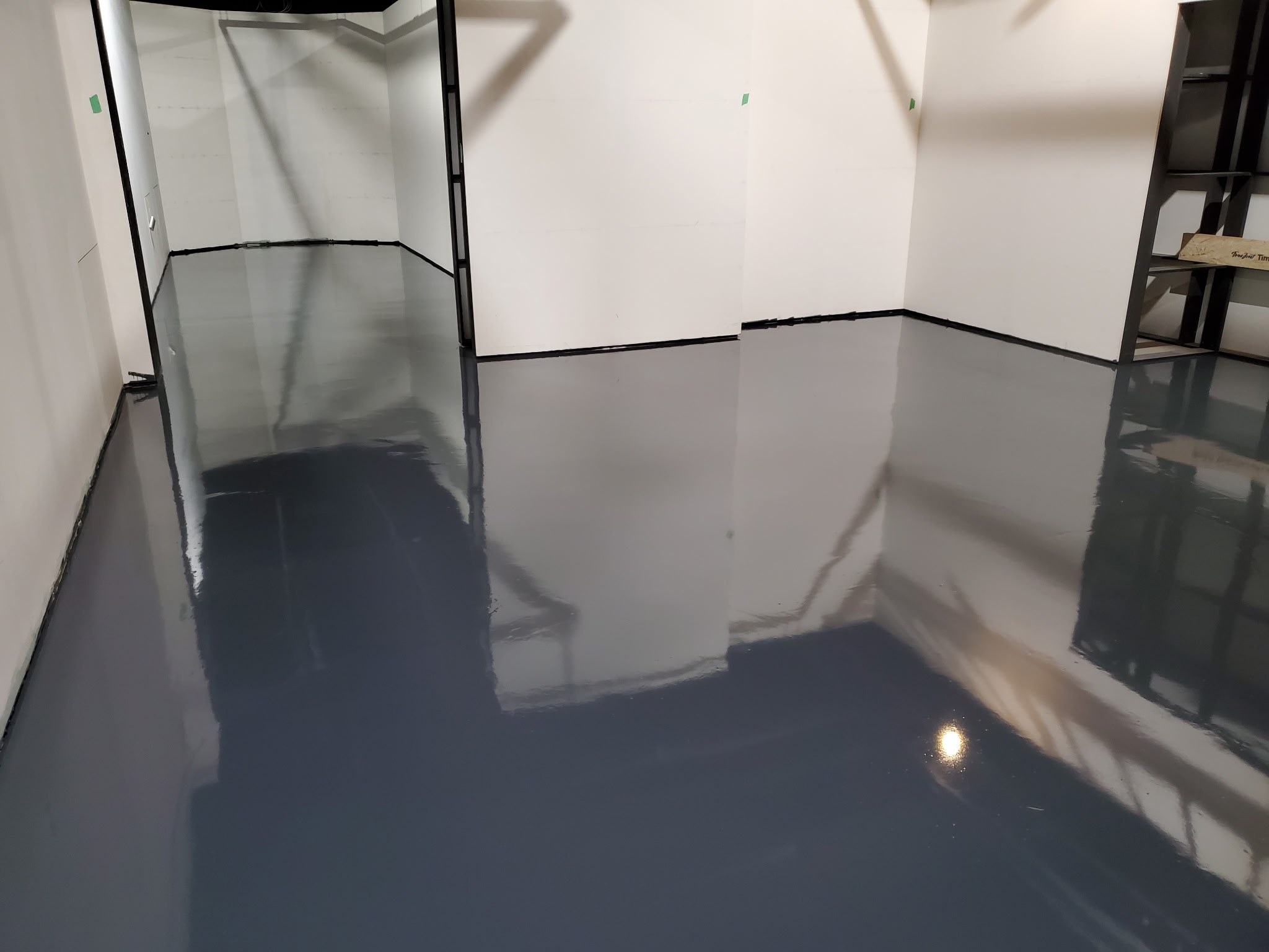 Dark blue glossy epoxy floor coating